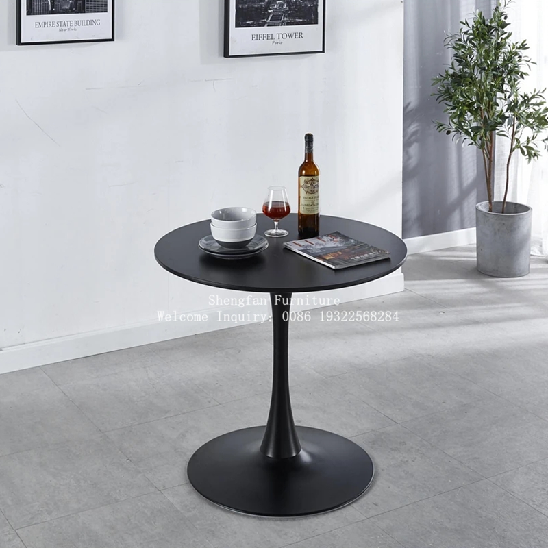 black round tulip dining table, round tulip dining table, tulip dining table black, black pedestal dining table, round pedestal dining table, modern tulip table, Scandinavian dining table, minimalist dining table, mid century modern dining table, Eero Saarinen tulip table, Saarinen style dining table, round kitchen table black, black round kitchen table, small round dining table black, large round dining table black, 4 seater round dining table, 6 seater round dining table, white top black base table, marble top tulip table black base, black marble round dining table, faux marble tulip table, wood top tulip dining table, walnut round dining table black base, matte black dining table, glossy black dining table, high gloss round table, luxury round dining table black, elegant round dining table, contemporary round dining table, modern kitchen furniture, dining room centerpiece table, space saving round table, compact dining table black, apartment dining table, condo dining table round, small space dining furniture, kitchen breakfast table round, cafe style round table, restaurant round table black, commercial dining table round, durable dining table black base, heavy duty pedestal table, metal base dining table, steel base round table, aluminum base tulip table, fiberglass tulip table style, resin top round table, scratch resistant dining table, heat resistant dining table top, easy clean dining table, stain resistant black table, modern home furniture table, designer dining table replica, tulip style furniture, iconic tulip base table, pedestal base dining table, single leg dining table, round table with pedestal base, no leg corner table design, ergonomic dining table space, family dining table round, cozy dining setup table, minimalist home dining setup, modern dining room decor, black furniture dining set, black dining room table ideas, round table dining room decor, stylish dining table black, luxury interior dining table, high end dining furniture, affordable modern dining table, cheap round dining table black, budget dining table round black, premium dining table design, contemporary furniture black table, Scandinavian home decor table, Nordic dining table black, simple elegant dining table, sleek black table design, ultra modern dining table, futuristic dining table design, designer home dining furniture, iconic modern furniture piece, mid century furniture replica table, tulip base replica table, vintage modern dining table, retro modern dining table black, classic modern tulip table, architectural dining table design, artistic dining table black, statement dining table piece, centerpiece round table dining, round table for 2 black, round table for 4 black, round table for 6 black, dining table for small family, dining table for large family, extendable round dining table black, fixed round dining table, non extendable tulip table, stable dining table base, wobble free dining table, sturdy pedestal dining table, anti slip dining table base, floor friendly dining table, scratch safe table legs, protective floor base dining table, modern apartment furniture black, studio apartment dining table, tiny home dining table round, space efficient furniture dining, minimalist kitchen furniture black, modern black kitchen decor table, black and white dining room table, monochrome dining table design, luxury black interior furniture, designer dining room setup, elegant home dining decor, aesthetic dining table black, Instagram worthy dining table, Pinterest style dining table, viral home decor table, trending dining table design, modern aesthetic furniture table, black gloss interior decor, matte black interior design table, contemporary home styling table, Scandinavian minimal dining decor, Japandi style dining table black, Japanese minimalist dining table, clean line furniture dining table, smooth edge round table, rounded edge safe table design, child friendly dining table round, family safe pedestal table, pet friendly dining table black, durable home dining furniture, long lasting dining table base, strong metal pedestal table, reinforced base dining table, stable circular dining table, balanced weight dining table base, designer inspired dining furniture, luxury replica tulip table, high quality reproduction table, modern replica furniture black, affordable designer dining table, budget modern tulip table, premium home dining furniture, stylish kitchen dining table black, functional dining table design, everyday dining table black, breakfast nook round table, coffee dining hybrid table, multipurpose round table black, living room dining table combo, open plan dining table design, loft apartment dining table, industrial modern dining table black, industrial chic round table, rustic modern black table, black wood grain round table, engineered wood round dining table, MDF top tulip table black base, durable laminate round table, water resistant dining surface, heat proof dining table black, easy maintenance dining table, wipe clean round table black, smooth surface dining table, polished finish round table, textured matte dining table black, designer home centerpiece table, luxury kitchen island alternative table, small kitchen round table black, medium round dining table black, large luxury round table black, banquet style round table, event dining round table black, wedding reception round table black, party dining table black round, hospitality dining table black base, hotel dining furniture table black, restaurant decor round table black, modern café interior table black, bistro round table black pedestal, elegant café dining table black, outdoor indoor round table black, indoor dining table black round, patio dining table black round, balcony small round table black, terrace dining table round black, rooftop dining table black, modern black patio furniture table, UV resistant black dining table, weather resistant outdoor round table, metal outdoor dining table black, composite top dining table black, stone top round dining table black, granite round dining table black, quartz round dining table black, ceramic top tulip table black base, luxury stone dining table round black, high durability dining furniture black, premium finish dining table black, designer home table round black, modern furniture collection dining table, minimalist round pedestal table black, sleek pedestal dining table black, smooth modern round table black, contemporary pedestal table black, stylish round kitchen table black, functional home dining table black, elegant round pedestal table black, modern dining furniture black set, black dining table set round chairs, dining table with chairs black round, matching dining set black round table, modern dining set black pedestal table, Scandinavian dining set black round table, luxury dining set black round table, compact dining set black round table, apartment dining set black round table, home dining setup black round table, modern kitchen setup black table, stylish dining room furniture black, elegant dining room centerpiece black table, designer dining room furniture black round table