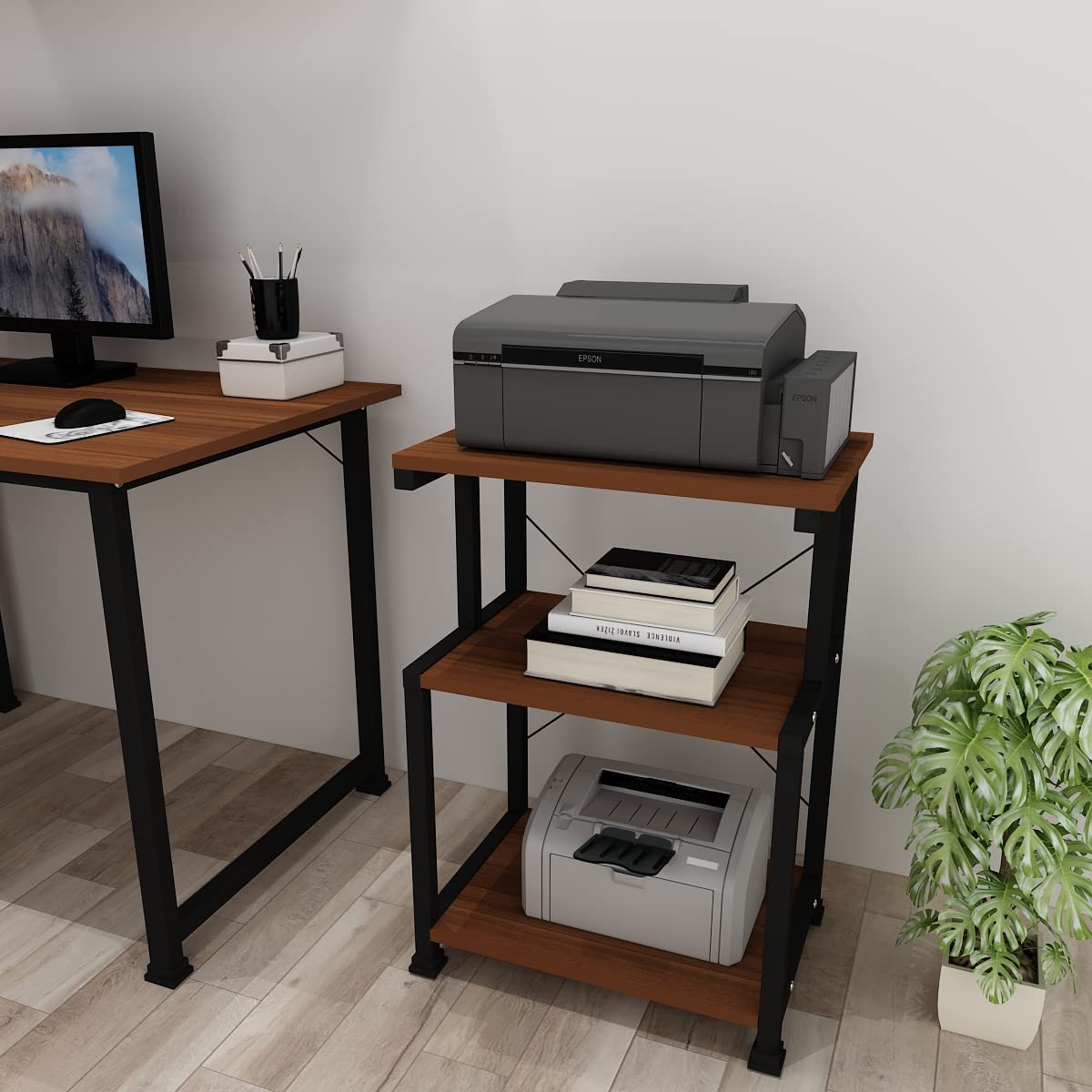 The Multi Purpose 3 Tier Book Shelf is a practical and stylish storage solution designed to help organize books, office supplies, décor items, files, and household essentials. With its compact three-tier design, this bookshelf offers the perfect balance of storage capacity and space efficiency, making it ideal for homes, offices, study rooms, libraries, bedrooms, and living rooms. Constructed from high-quality materials, the bookshelf is built for durability, stability, and long-lasting performance. The three spacious shelves provide ample room for storing books, magazines, folders, photo frames, potted plants, ornaments, and other everyday items. Its open-shelf design allows for easy access and creates an attractive display area for your favorite belongings. The modern and versatile design complements a variety of interior décor styles, including contemporary, minimalist, industrial, and traditional spaces. Whether used as a bookcase, display rack, storage organizer, or decorative shelf, this furniture piece enhances both functionality and aesthetics. Its compact footprint makes it ideal for apartments, home offices, classrooms, and smaller rooms where efficient use of space is essential. Easy to maintain and highly versatile, the Multi Purpose 3 Tier Book Shelf is a smart addition to any organized living or working environment. Key Features Three spacious storage shelves Multi-purpose storage and display functionality Durable and sturdy construction Modern and stylish design Open shelving for easy access Space-saving vertical structure Suitable for home and office use Ideal for books, décor, files, and accessories Easy to clean and maintain Long-lasting and stable performance
