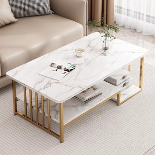 The White Marble Coffee Table is a luxurious and elegant centerpiece designed to elevate the style and functionality of any living room, lounge, office reception, or modern apartment. Featuring a smooth white marble top with a refined finish, this coffee table brings a timeless sense of sophistication and brightness to interior spaces. Crafted from high-quality marble and supported by a strong, durable base, the table is built for stability, strength, and long-lasting performance. The polished surface is resistant to heat and easy to clean, making it ideal for daily use while maintaining its premium appearance over time. Its versatile design blends seamlessly with modern, minimalist, Scandinavian, and luxury interior styles. Whether used for serving drinks, displaying décor items, holding books, or enhancing your living room setup, the White Marble Coffee Table offers both practicality and aesthetic appeal. Perfect for homes, offices, hotels, and upscale lounges, this table serves as both a functional furniture piece and a statement of elegance in any space. Key Features Premium white marble tabletop Elegant and modern luxury design Strong and stable base construction Heat-resistant and durable surface Easy to clean and maintain Suitable for home, office, and lounge use Enhances modern interior décor Spacious tabletop for daily use Long-lasting and high-quality construction Stylish centerpiece for living spaces