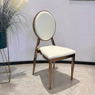 The Gold Stackable Conference Chair is an elegant and durable seating solution designed for conferences, banquets, hotels, weddings, churches, training centers, corporate events, and meeting halls. Featuring a luxurious gold-finished frame and comfortable upholstered seating, this chair combines sophistication, comfort, and practicality, making it a perfect choice for professional and special event settings. Built with a heavy-duty steel frame, the chair provides exceptional stability and long-lasting performance even in high-traffic environments. The padded seat and backrest offer superior comfort during extended conferences, seminars, ceremonies, and social gatherings. Its ergonomic design supports proper posture while enhancing the overall seating experience. One of its key advantages is the stackable design, allowing multiple chairs to be neatly stacked for convenient storage and transportation. This feature makes it ideal for venues that require flexible seating arrangements and efficient space management. The stylish gold finish adds a touch of luxury and professionalism to banquet halls, conference rooms, wedding venues, hotels, and event spaces, creating a refined and welcoming atmosphere. Key Features Elegant gold-finished metal frame Stackable design for easy storage Comfortable padded seat and backrest Heavy-duty and durable construction Suitable for conferences, banquets, and events Ergonomic seating for enhanced comfort Easy to transport and arrange Stable and long-lasting performance Professional and luxurious appearance Ideal for commercial and hospitality use