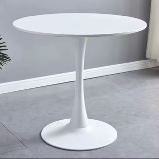 The Round White Dining Table is a stylish and contemporary dining table designed to bring elegance, functionality, and comfort to your dining space. Its clean white finish and modern round design make it a perfect centerpiece for dining rooms, kitchens, apartments, cafés, restaurants, and office break rooms. Whether you're enjoying everyday family meals or entertaining guests, this dining table offers both practicality and timeless appeal. Crafted from premium-quality materials, the table is built for exceptional durability, stability, and long-lasting performance. The spacious round tabletop comfortably accommodates family members and guests while encouraging conversation and creating a warm, welcoming dining atmosphere. Its smooth, scratch-resistant surface is easy to clean, making it ideal for daily use. The minimalist white finish complements a wide range of interior styles, including modern, Scandinavian, contemporary, minimalist, and classic décor. Its compact round shape makes it an excellent choice for both small and large dining spaces, maximizing seating while saving floor space. Perfect for homes, apartments, cafés, restaurants, hotels, and offices, the Round White Dining Table combines elegance, quality, and functionality to enhance any dining environment. Key Features Elegant white round tabletop Modern and minimalist design Durable and sturdy construction Spacious dining surface Scratch-resistant and easy-to-clean finish Stable base for enhanced support Space-saving round shape Suitable for homes and commercial spaces Ideal for dining rooms, kitchens, cafés, and restaurants Long-lasting quality and durability