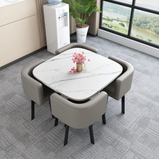 The 4 Seater Marble Dining Set is a perfect blend of luxury, elegance, and functionality, designed to transform your dining area into a sophisticated and welcoming space. Featuring a premium marble tabletop and four matching dining chairs, this dining set is ideal for homes, apartments, restaurants, hotels, and modern dining rooms. Crafted from high-quality materials, the marble tabletop offers exceptional durability, heat resistance, and easy maintenance. Its smooth polished surface adds a luxurious touch while providing ample space for family meals, entertaining guests, and everyday dining. The sturdy frame ensures excellent stability and long-lasting performance, making it a reliable addition to any home. The four accompanying dining chairs are designed for comfort and support, allowing you and your guests to enjoy extended dining experiences. The elegant design complements a wide range of interior styles, including modern, contemporary, minimalist, and luxury décor themes. Whether placed in a dining room, kitchen, apartment, café, or restaurant, the 4 Seater Marble Dining Set creates a stylish focal point while maximizing functionality. Its compact size makes it ideal for small to medium-sized spaces without sacrificing comfort or elegance. Key Features Premium marble tabletop finish Complete 4-seater dining set Durable and stable construction Heat-resistant and easy-to-clean surface Comfortable matching dining chairs Elegant and modern design Suitable for homes, apartments, and restaurants Space-efficient dining solution Long-lasting quality materials Enhances modern interior décor