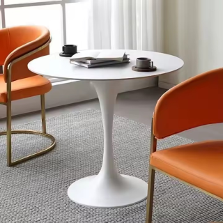 The Round White Outdoor Dining Table is a stylish, durable, and weather-resistant table designed to transform your outdoor living and dining spaces. Perfect for patios, gardens, balconies, terraces, poolside areas, cafés, restaurants, hotels, and resorts, this elegant dining table offers a comfortable gathering space for family meals, outdoor entertaining, and casual conversations. Constructed from premium-quality weather-resistant materials, the table is built to withstand sun exposure, rain, and everyday outdoor use while maintaining its attractive appearance. The sturdy frame provides excellent stability, while the spacious round tabletop comfortably accommodates family members and guests for dining, coffee breaks, or social gatherings. Its modern white finish adds a clean and sophisticated look that complements contemporary, minimalist, Scandinavian, coastal, and traditional outdoor décor. The smooth surface is scratch-resistant, easy to clean, and requires minimal maintenance, making it ideal for both residential and commercial settings. The round design encourages conversation by allowing everyone to sit comfortably while maximizing space efficiency. Whether you're furnishing a backyard, balcony, restaurant terrace, or hotel garden, the Round White Outdoor Dining Table delivers lasting quality, functionality, and timeless elegance. Key Features Elegant round white tabletop Weather-resistant and UV-resistant construction Strong, stable, and durable frame Spacious dining surface for family and guests Scratch-resistant and easy-to-clean finish Suitable for indoor and outdoor use Modern and stylish design Ideal for gardens, patios, balconies, cafés, and restaurants Space-saving round shape Built for long-lasting outdoor performance