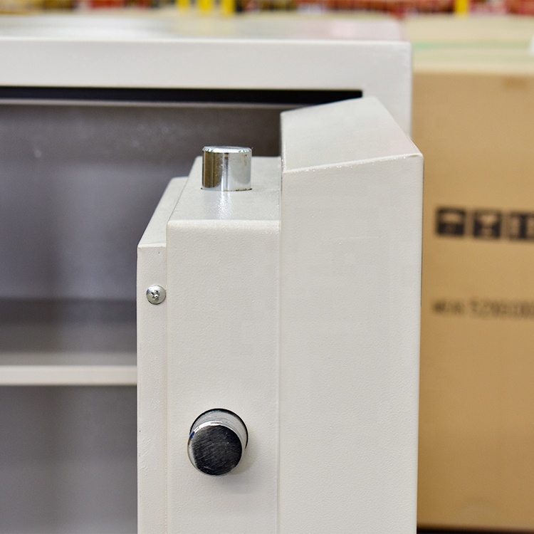 The Digital White Fireproof Safe is a modern security solution designed to protect your valuables, important documents, cash, jewelry, passports, certificates, and electronic devices from theft and fire damage. Featuring a sleek white finish and advanced digital locking technology, this safe combines security, convenience, and contemporary style for homes, offices, hotels, and commercial spaces. Constructed from heavy-duty reinforced steel, the safe offers superior protection against unauthorized access while its fire-resistant design helps safeguard critical belongings during emergencies. The digital keypad lock allows quick and secure access using a personalized code, providing enhanced security compared to traditional lock systems. Its spacious interior is ideal for storing legal documents, cash, laptops, jewelry, title deeds, business records, and other valuable possessions. The elegant white finish blends seamlessly with modern office and home interiors, making it both a functional security device and a stylish addition to your space. Perfect for business owners, professionals, homeowners, and institutions, the Digital White Fireproof Safe provides peace of mind through reliable protection and long-lasting durability. Key Features Advanced digital keypad locking system Fireproof and theft-resistant construction Heavy-duty reinforced steel body Elegant modern white finish Spacious interior storage capacity Secure access with programmable code Suitable for documents, cash, jewelry, and valuables Ideal for home, office, hotel, and business use Durable and long-lasting design Easy to operate and maintain