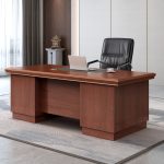 The 1.4M Executive Office Desk is a stylish and practical workstation designed to enhance productivity in executive offices, home offices, and professional workspaces. With its spacious 1.4-meter desktop, this desk provides ample room for a computer, laptop, documents, office accessories, and other daily essentials while maintaining a clean and organized workspace. Constructed from high-quality engineered wood with a durable finish, the desk is built to withstand everyday use and maintain its modern appearance. Its sturdy frame ensures excellent stability, while the contemporary design complements a wide range of office interiors. Integrated storage drawers and lockable cabinets provide secure space for files, stationery, and important documents, helping you stay organized throughout the workday. Whether you're furnishing a corporate office, private executive suite, or home workspace, the 1.4M Executive Office Desk offers the perfect combination of elegance, durability, and functionality. Key Features: Spacious 1.4-meter work surface Modern executive office design Durable engineered wood construction Scratch-resistant and easy-to-clean finish Lockable drawers and storage cabinet Ample space for computers, laptops, and office accessories Strong and stable frame Professional appearance for executive offices Suitable for corporate offices, home offices, and study rooms Easy to assemble and built for long-lasting use