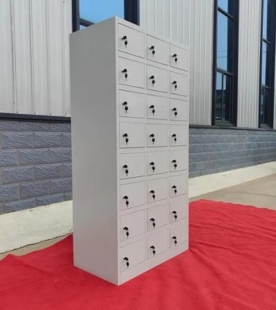 24-Lockable Steel Filing Cabinet Keep office files neat, safe, and easy to find with the 24-Lockable Steel Filing Cabinet. This steel cabinet provides 24 separate storage spaces for files, documents, records, and personal items. As a result, it helps offices reduce clutter and create a more organized working area. Secure 24-Compartment Storage The 24-lockable steel filing cabinet gives each user a separate storage space. Each compartment can hold files, folders, documents, and other office items. Therefore, staff can keep their work materials in one clear and easy-to-find place. In addition, the lockable compartments help control access to stored items. This feature makes the cabinet useful in offices where staff need private storage for documents and personal belongings. Strong Steel Filing Cabinet The cabinet uses a strong steel design for regular office use. It can handle the demands of a busy workplace and frequent daily use. Moreover, the steel body gives the cabinet a solid and practical structure. The 24-compartment layout also makes filing simple. Instead of leaving documents on desks, staff can place them inside their assigned compartments. Consequently, the office can maintain a cleaner and more organized appearance. Key Features 24 lockable storage compartments Strong steel cabinet design Separate space for each user Lockable storage for better privacy Suitable for files and office documents Helps reduce workplace clutter Easy way to organize staff records Suitable for busy offices Ideal for schools and institutions Useful for hospitals, SACCOs, NGOs, and businesses